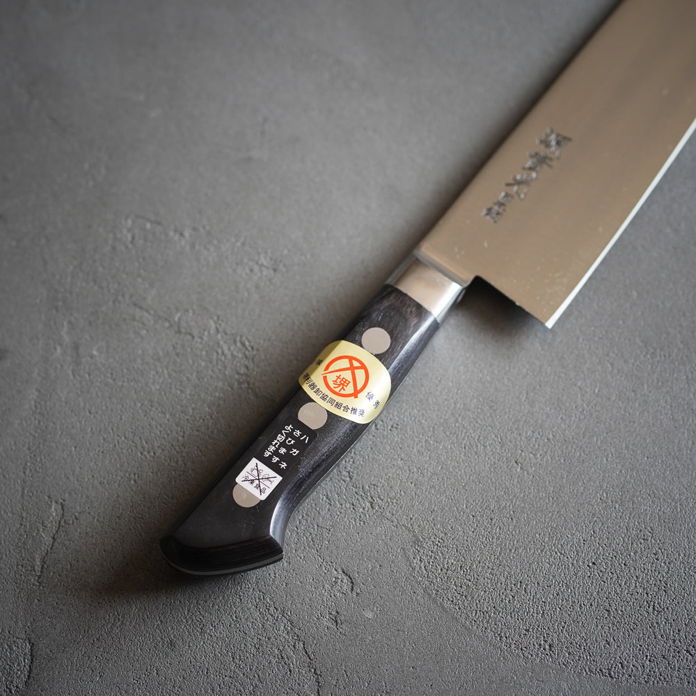 
                  
                    Japanese Steel Santoku Knife with Guard / Jikkou Cutlery
                  
                