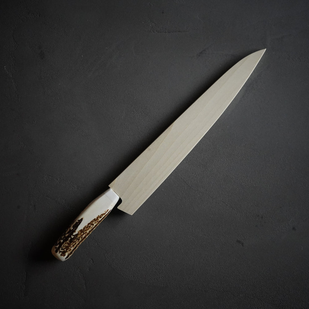 
                  
                    33-layer Damascus deer handle sujihiki knife 240mm / Sakai Takayuki
                  
                