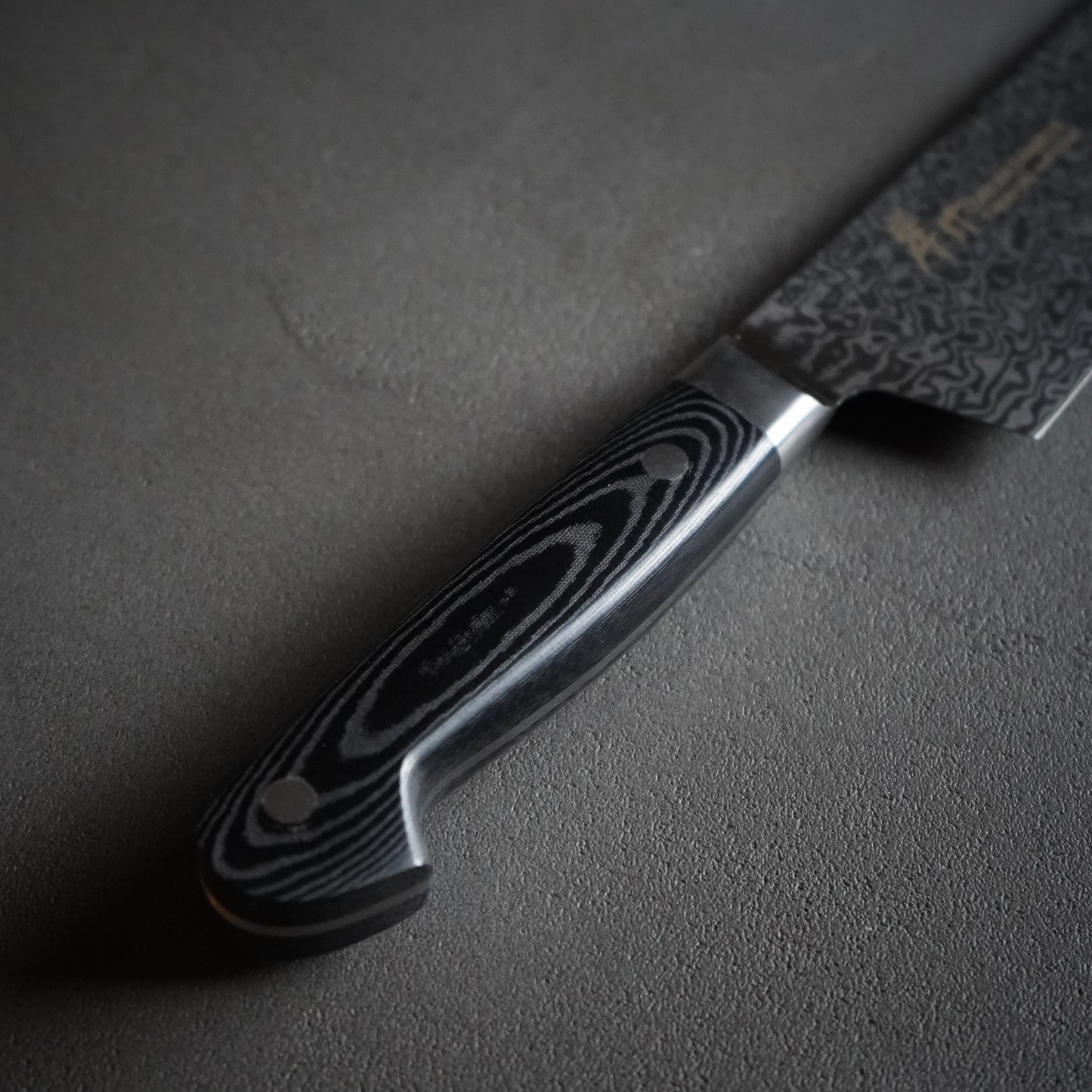 
                  
                    Coreless Damascus Sword-shaped Santoku / SAKAI TAKAYUKI
                  
                